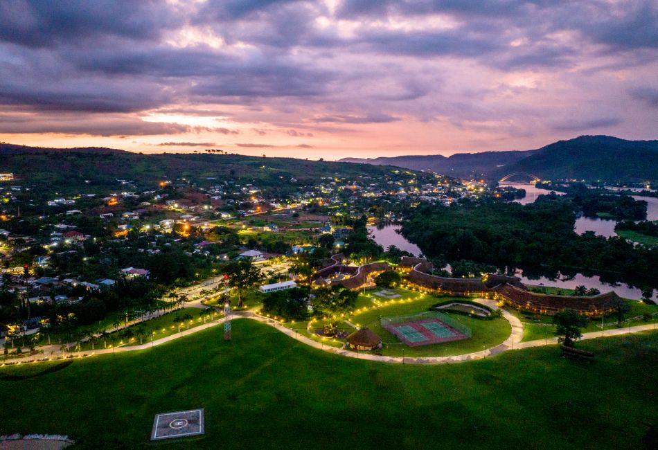 An sunset aerial view of the landscape at The Royal Senchi Hotel & Resort next to the Volta River in Ghana