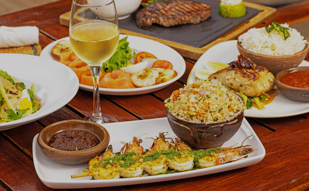 An image of the variety of hot continental food being served at The NSU Bar at The Royal Senchi Hotel & Resort in Ghana